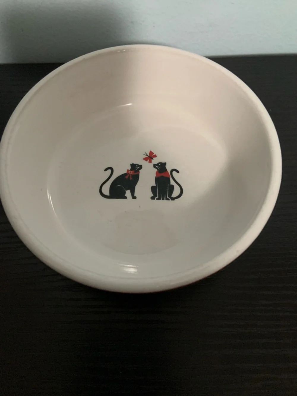 Pet bowl with whimsical city cats design